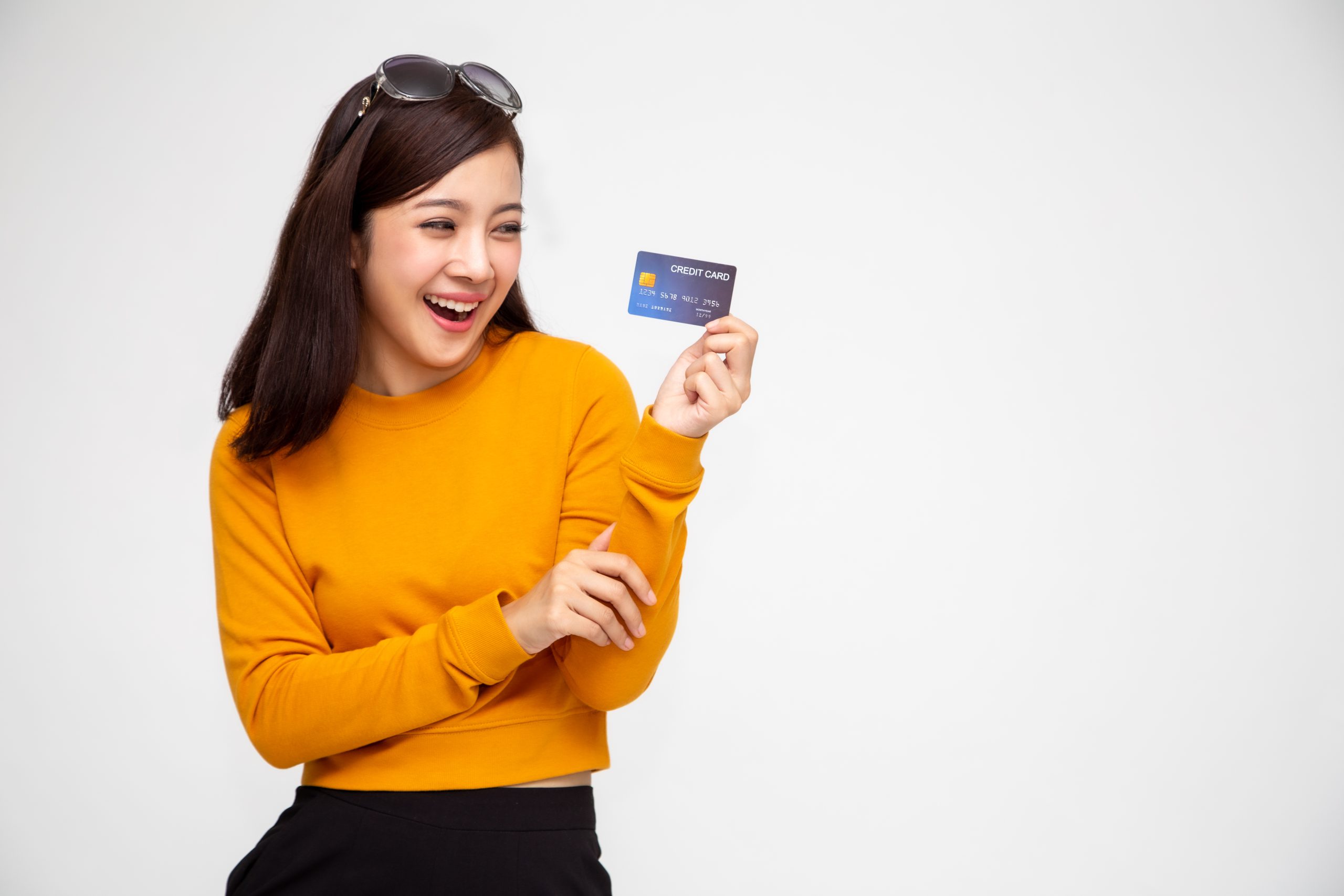 happy woman with credit card