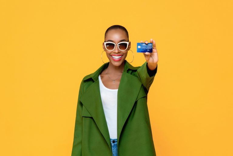 happy woman with credit card